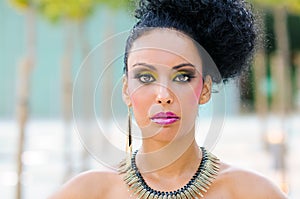 Young black woman, model of fashion with fantasy make-up