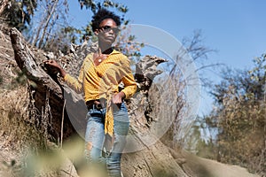 Young black woman observing nature photo