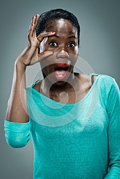 Young Black Woman with Surprise Expression