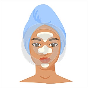 Young black woman with t-zone strips and towel on head. Skincare procedures at home. Cosmetic patches for nose, forehead