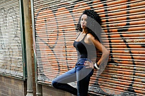 Young black woman in urban background