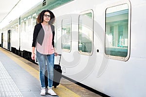 Young black woman waiting for the train