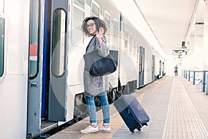 Young black woman waiting for the train