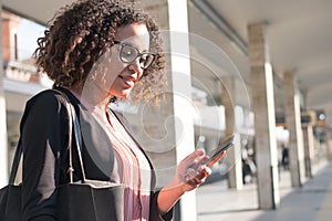 Young black woman waiting for the train