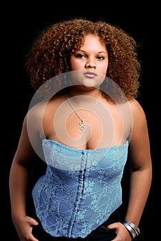 Young black woman wearing a blue corset necklace photo