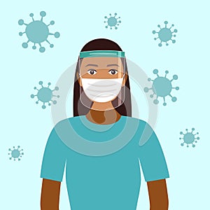 A young black woman wearing face mask and a plastic medical face shield.