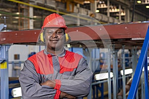 Young Black Worker In Personal Protective Equipment Looking At Camera