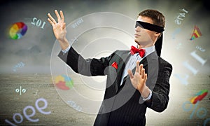 Young blindfolded man