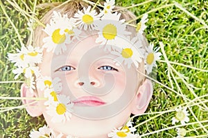 Young Blond Boy with a Daisy Crown