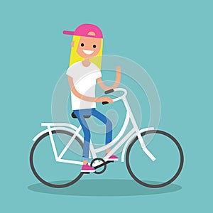 Young blond girl riding a bike and waving her hand / editable fl