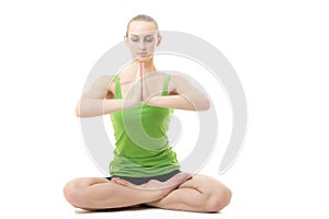 Young blond hair woman in yoga pose siddhasana