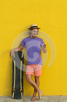 Young blond man with summer clothes