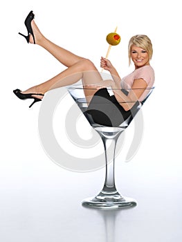 Young blond in a martini glass