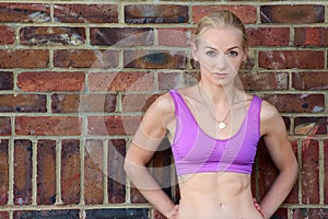 Young blond wearing exercise top