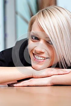 Young blond woman with a beautiful happy smile