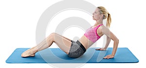 Young blond woman exercising