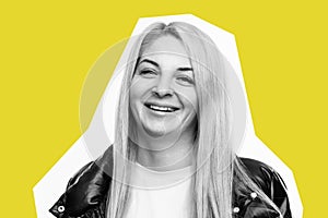 Young blond woman laughs. Black and white photo. Bright yellow background