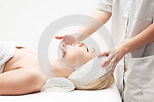 A young blond woman on a spa procedure