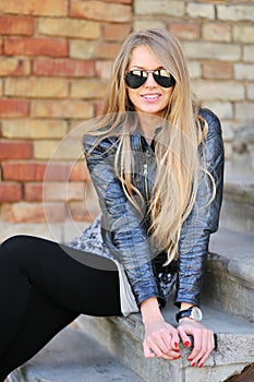 Young blond woman in a sunglasses