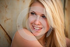 Young blonde caucasian girl alone on a street