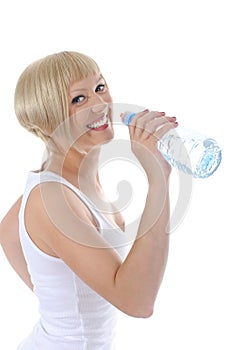 Young blonde drinking water