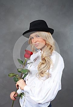 Young blonde girl with roses