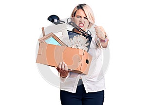 Young blonde plus size woman fired holding box annoyed and frustrated shouting with anger, yelling crazy with anger and hand