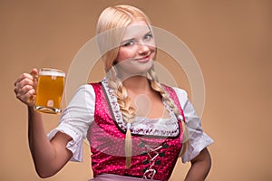 Young blonde wearing dirndl