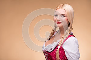 Young blonde wearing dirndl