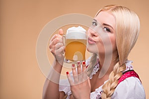 Young blonde wearing dirndl