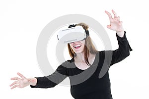 Young blonde woman with glasses of virtual reality gesticulate on White background