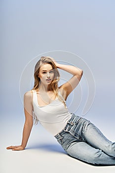 A young, blonde woman radiates calmness photo