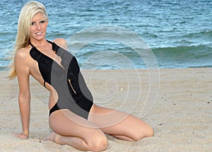 Young Blonde Woman in thought at beach