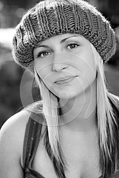 Young blonde woman wearing a knit hat