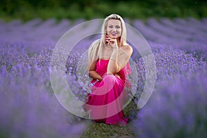 Young blondie in a lavender field