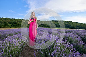 Young blondie in a lavender field