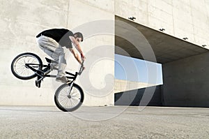 Young BMX bicycle rider photo