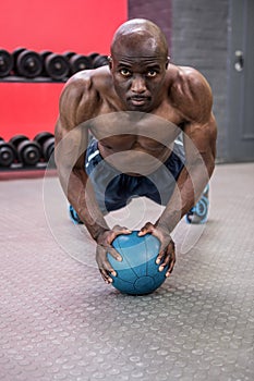 Young bodybuilder doing excercises