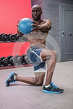 Young bodybuilder doing excercises