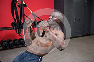 Young bodybuilder doing excercises