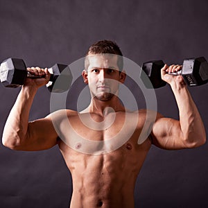 Young bodybuilder traininig