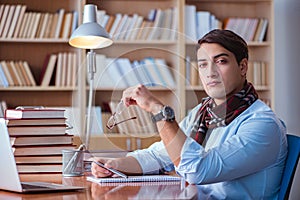 The young book writer writing in library