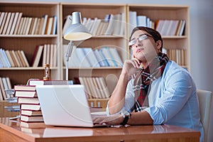 The young book writer writing in library