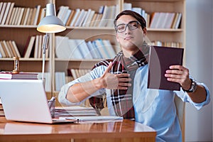 The young book writer writing in library