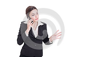 Young bossy business manager woman talking on the phone