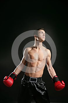 Young boxer man isolated on studio