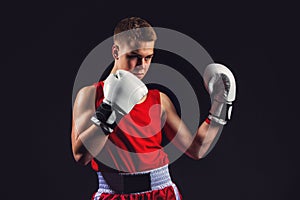 Young boxer sportsman in red sport suit