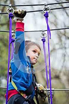 Young boy in adventure park