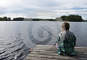 Young boy angling