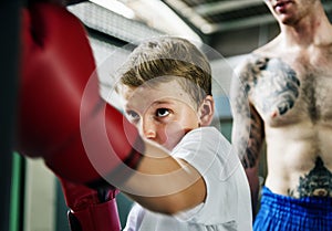 Young boy aspiring to become a boxer